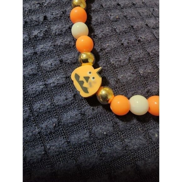 Handmade Orange and White Halloween Stretch Bracelet with Pumpkin - Picture 11 of 11